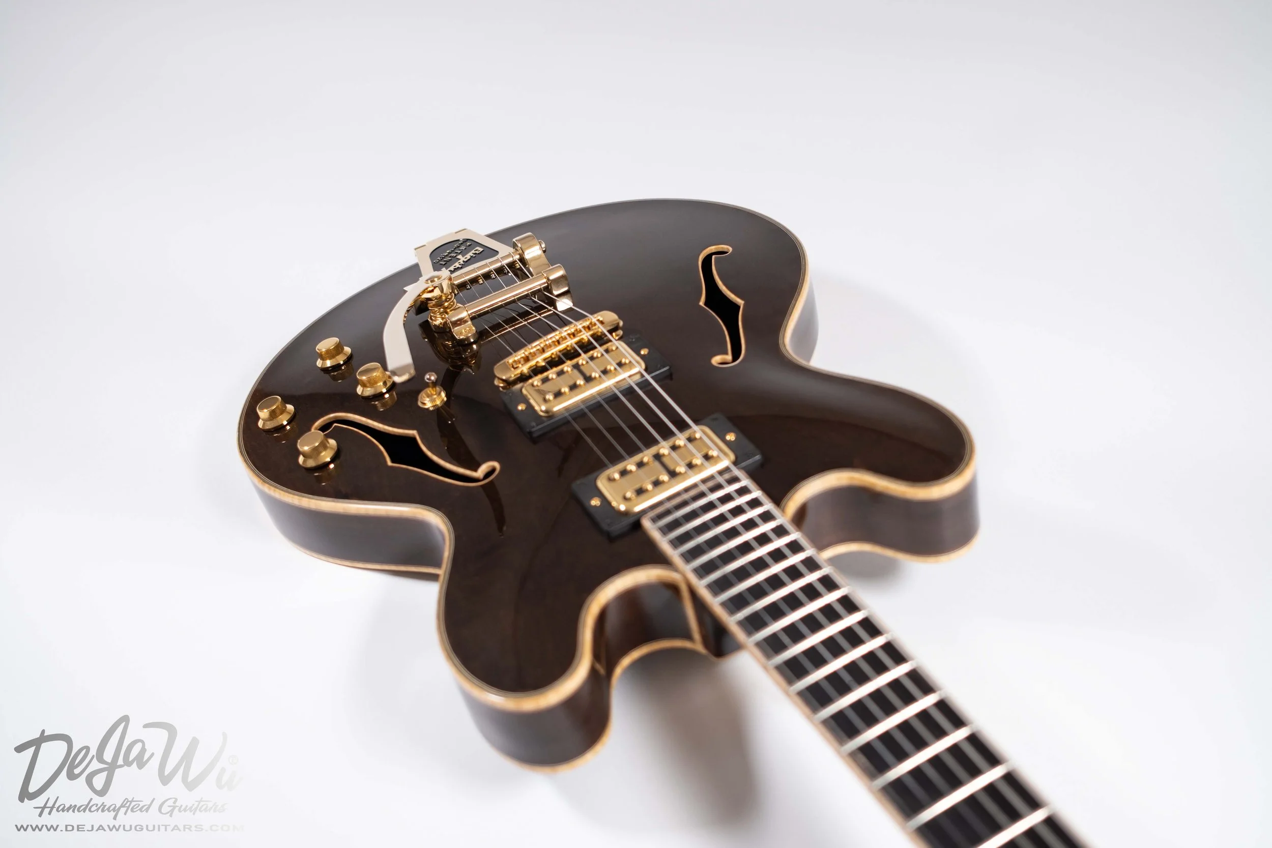 Dejawu guitars presents semi-acoustic guitar hand-carved from